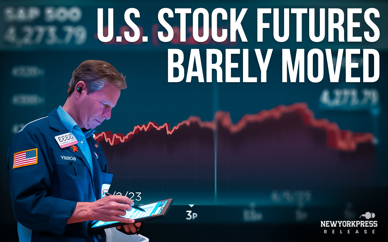 U.S. stock futures barely moved following the Nasdaq’s record-breaking rally